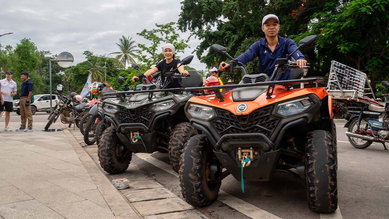 Quad bike riding in countryside fields